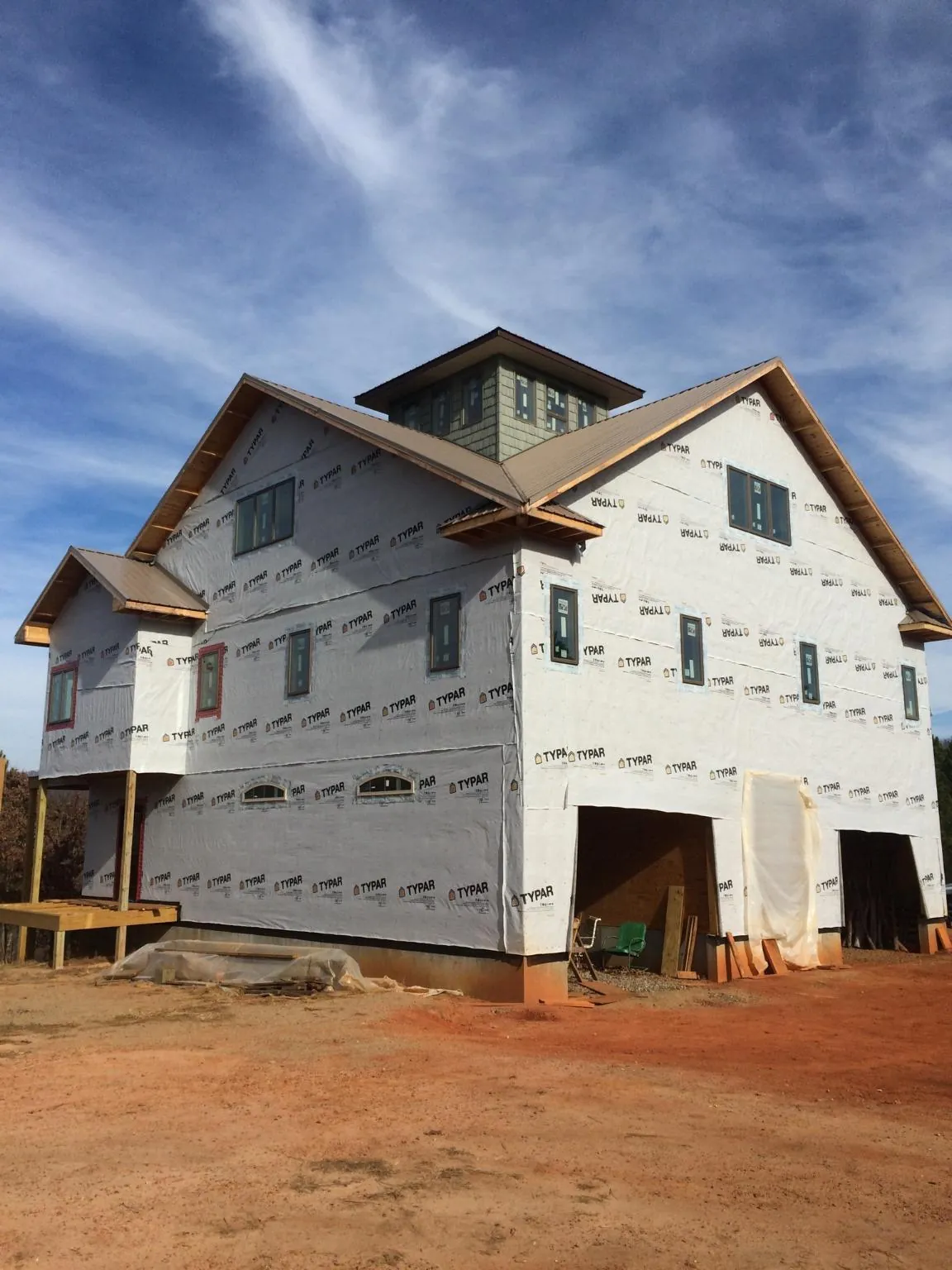 New two story house under construction with a cupola and gabled roofs in Thurmont